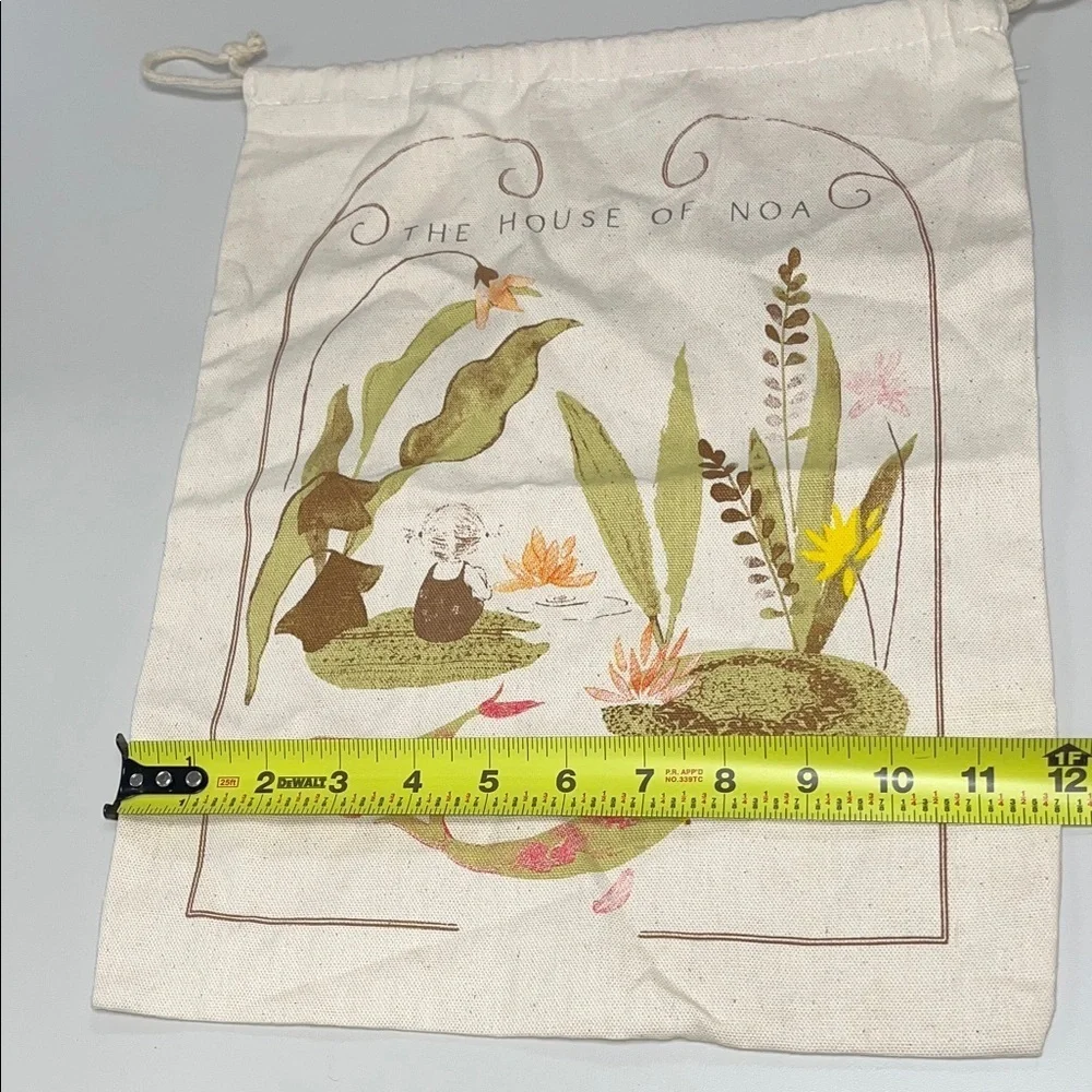 The House of Noa Cream Drawstring Dust Bag with darling print